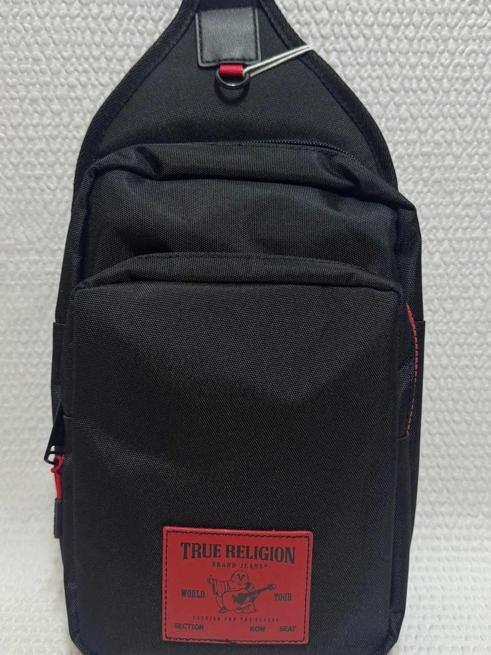 True Religion Men's Black Crossbody Sling Bag with Red Accent travel bag